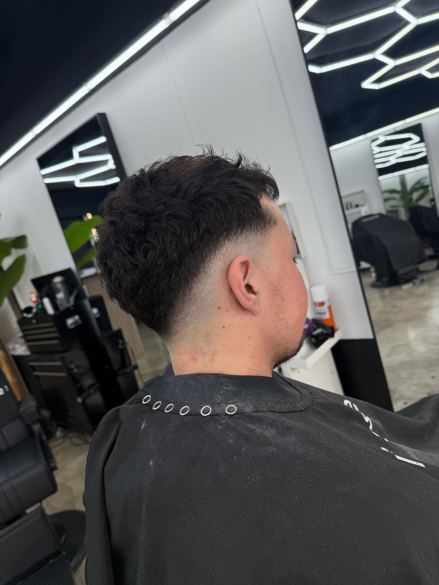 Client haircut at blessed barbers