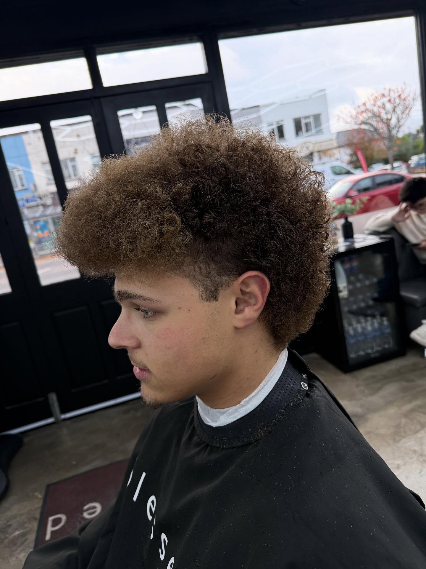 Client haircut at blessed barbers