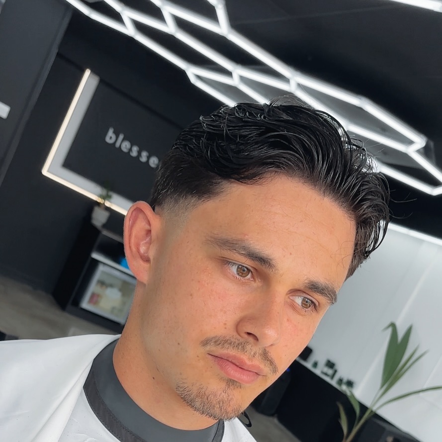 Client haircut at blessed barbers